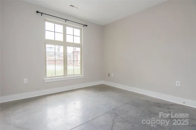 an empty room with an entryway
