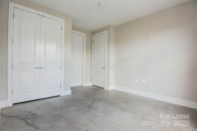 a bathroom with a sink a vanity and a bathtub