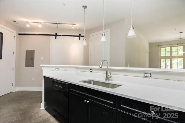 a bathroom with a double vanity sink a mirror and shower