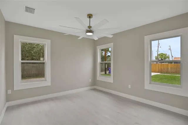 a bathroom with a toilet sink and shower