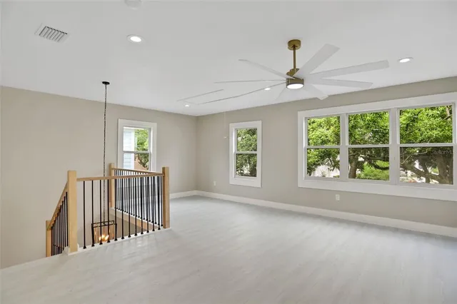a bathroom with a toilet sink and window