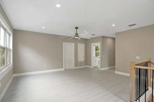 an empty room with windows