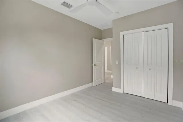 an aerial view of residential house with parking space