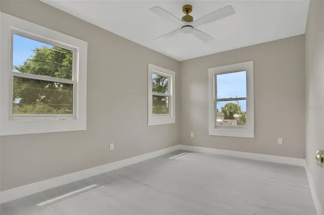 an aerial view of a house with a garden