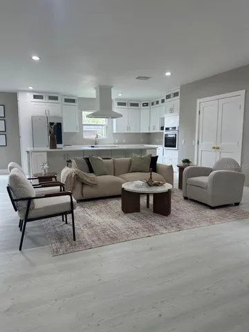 a view of a livingroom with furniture window and outside view
