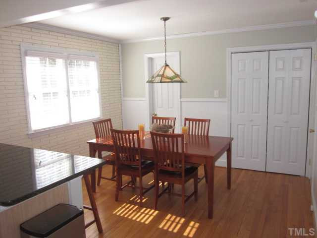 2031 Reaves Drive Raleigh, NC 27608 - Photo 18 of 25 Nice breakfast area just off the kitchen! Lovely hardwood floors and tons of updates already done for the buyer! This home has lot of natural light! Breakfast Area