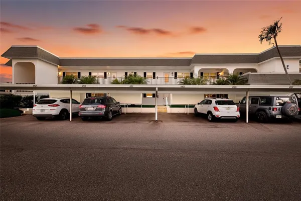 a car parked in front of a parking