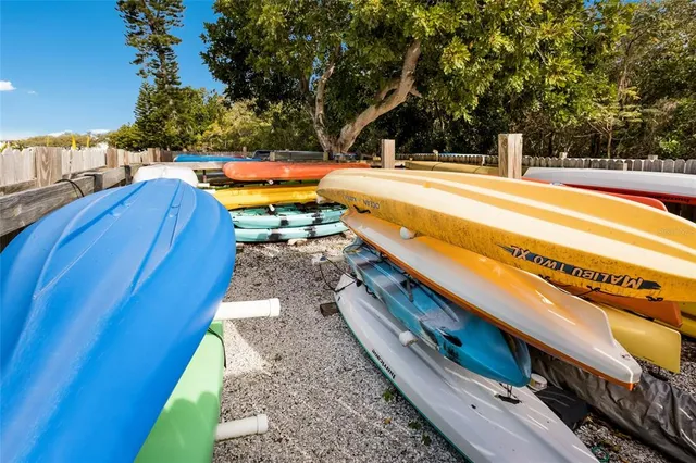 a view of a lake with a house in the background