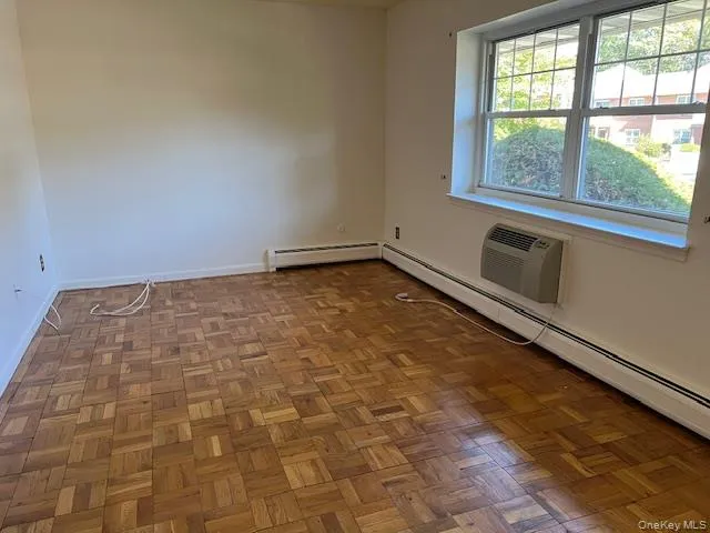 a view of an empty room and window