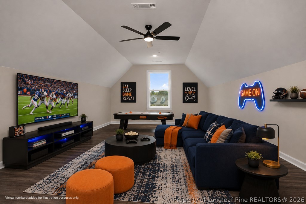 3025 Old Stage Road South Erwin, NC 28339 - Photo 34 of 50 a living room with furniture and a flat screen tv with wooden floor
