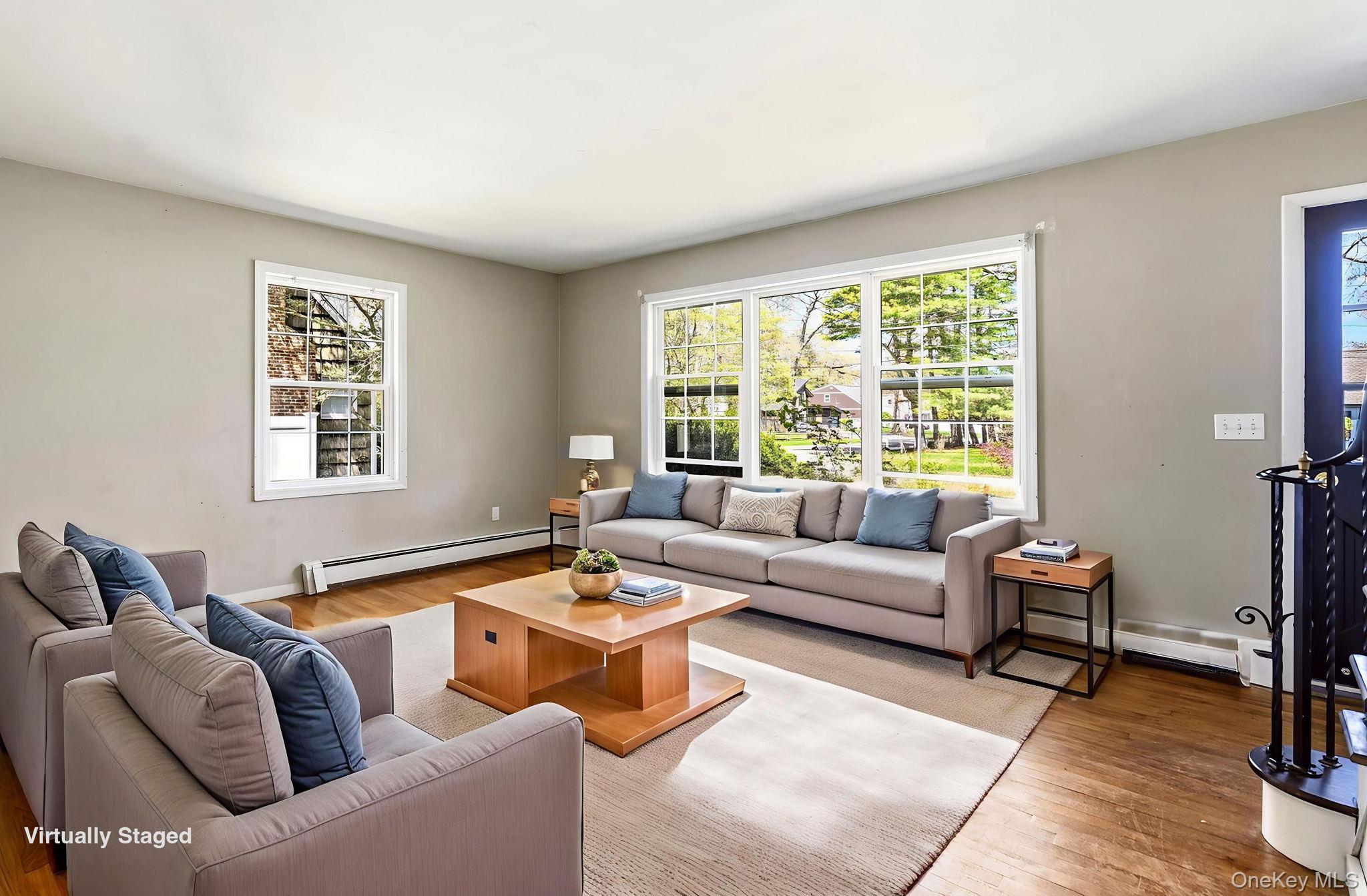 9 White Birch Lane Remsenburg, NY 11960 - Photo 5 of 20 Living room virtually staged.