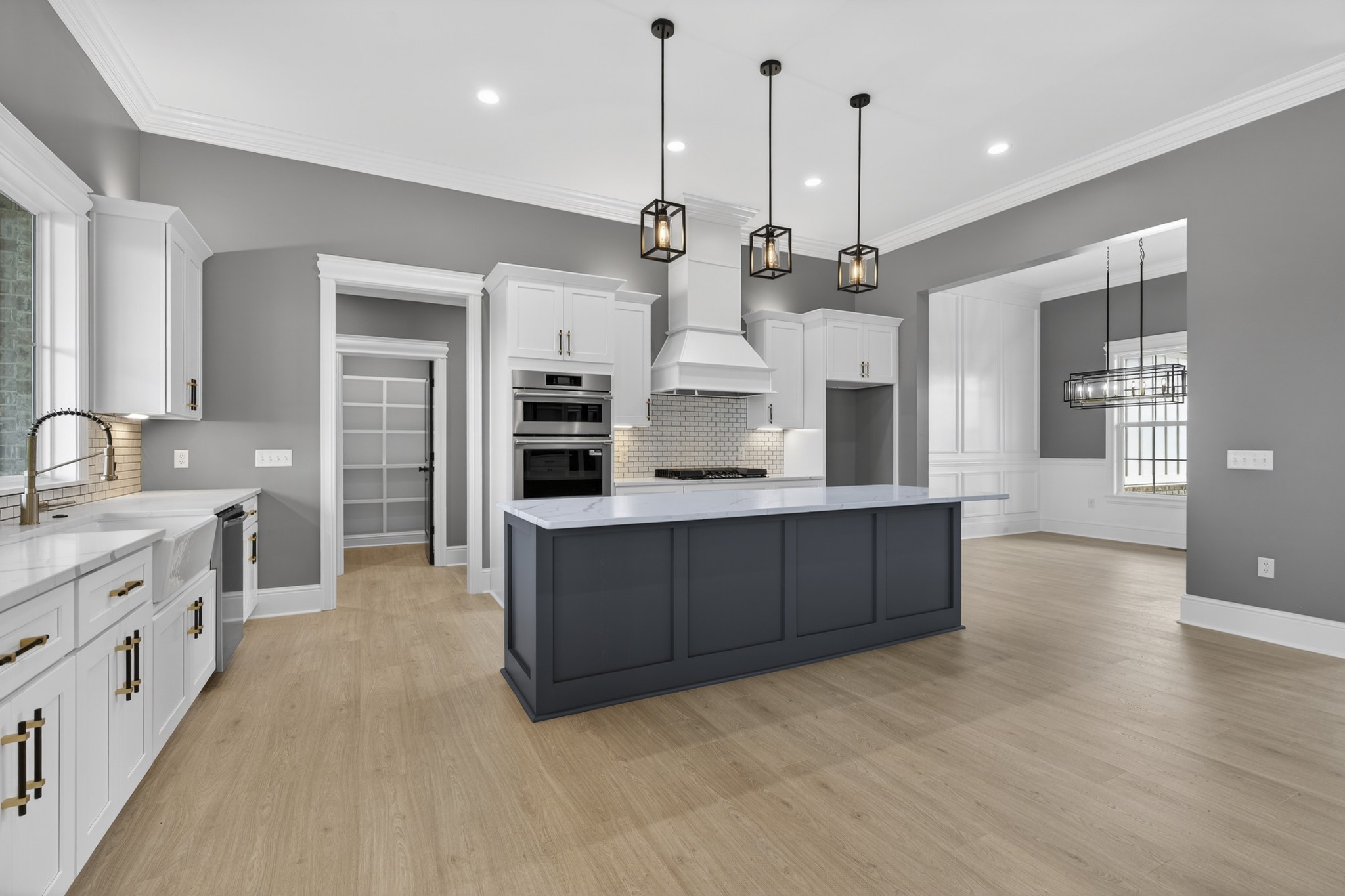 2941 Burgess Falls Road Cookeville, TN 38506 - Photo 22 of 60 a large kitchen with stainless steel appliances kitchen island granite countertop a sink a counter space and cabinets