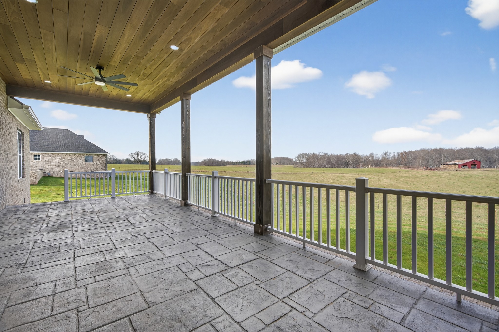 2941 Burgess Falls Road Cookeville, TN 38506 - Photo 8 of 60 a view of a swimming pool with a porch