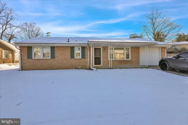 front view of house with a yard