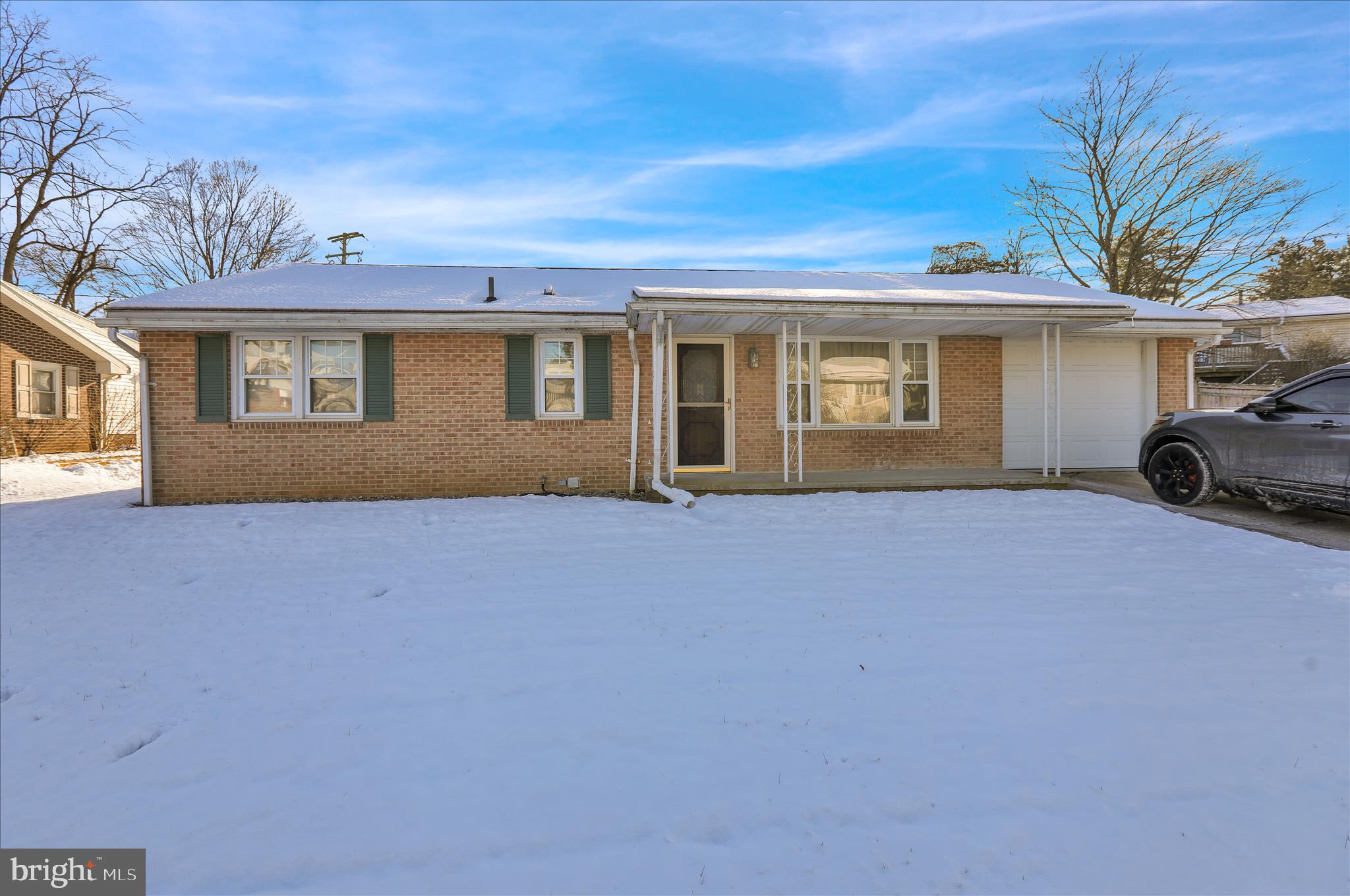 front view of house with a yard