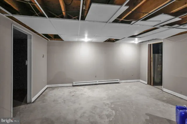 a view of backyard with large tree