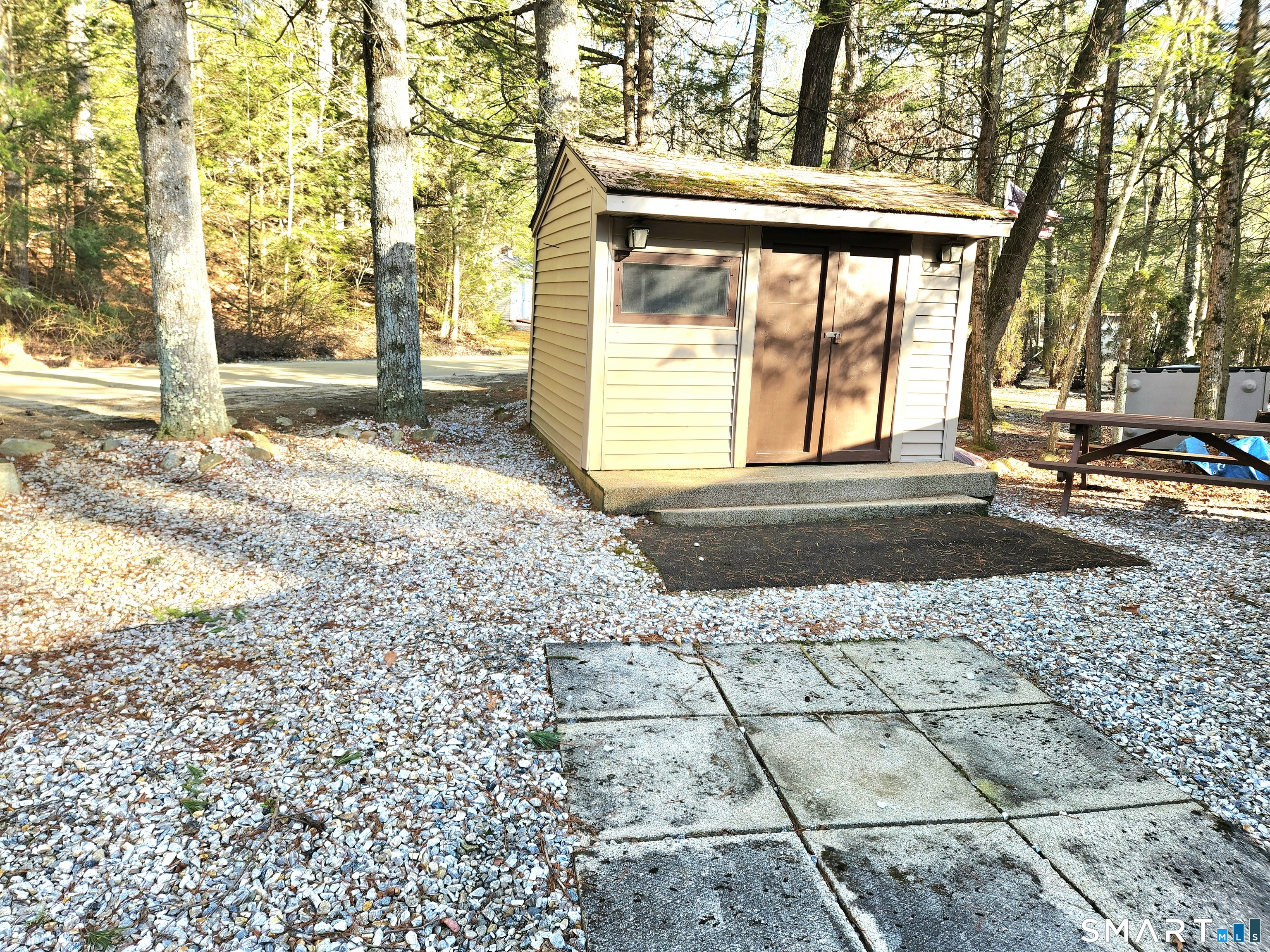 51 Old Springfield Road, Unit 123 Stafford, CT 06076 - Photo 2 of 19 a view of entrance gate of a house