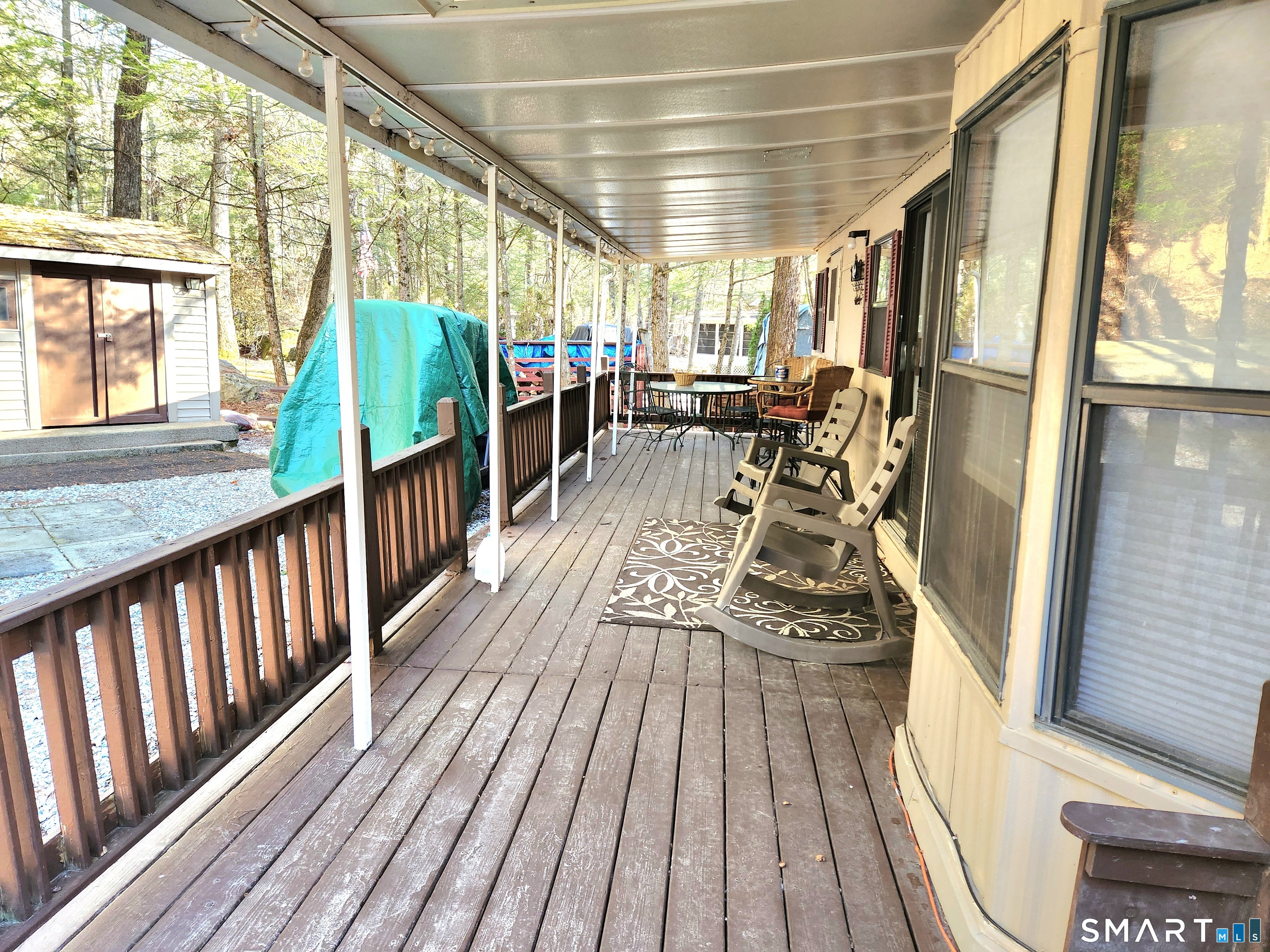 51 Old Springfield Road, Unit 123 Stafford, CT 06076 - Photo 3 of 19 a view of a couches with wooden floor