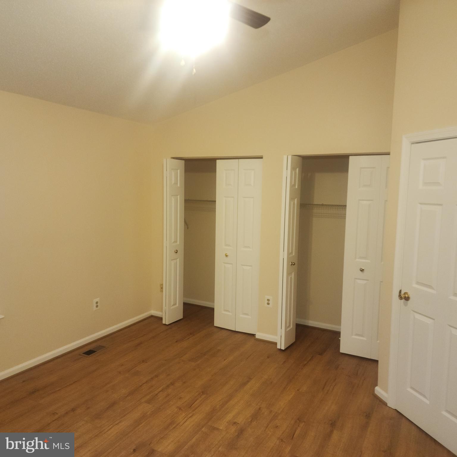 7438 Catterick Court Baltimore, MD 21244 - Photo 17 of 27 an empty room with wooden floor