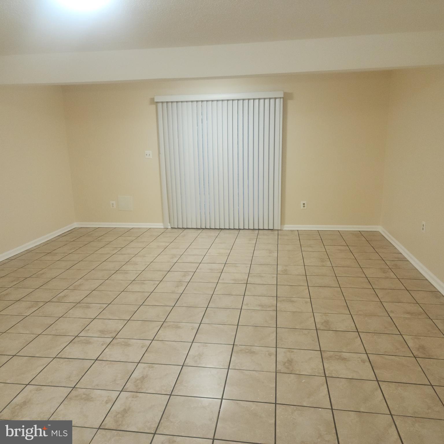 7438 Catterick Court Baltimore, MD 21244 - Photo 21 of 27 a view of an empty room and window