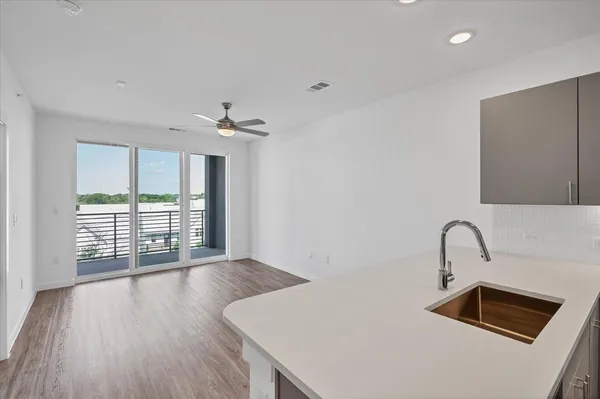a bathroom with a sink and a window