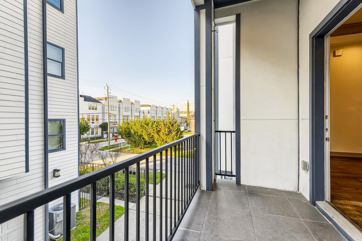 2208 Arabelle Street Houston, TX 77007 - Photo 9 of 26 a view of a balcony from a window