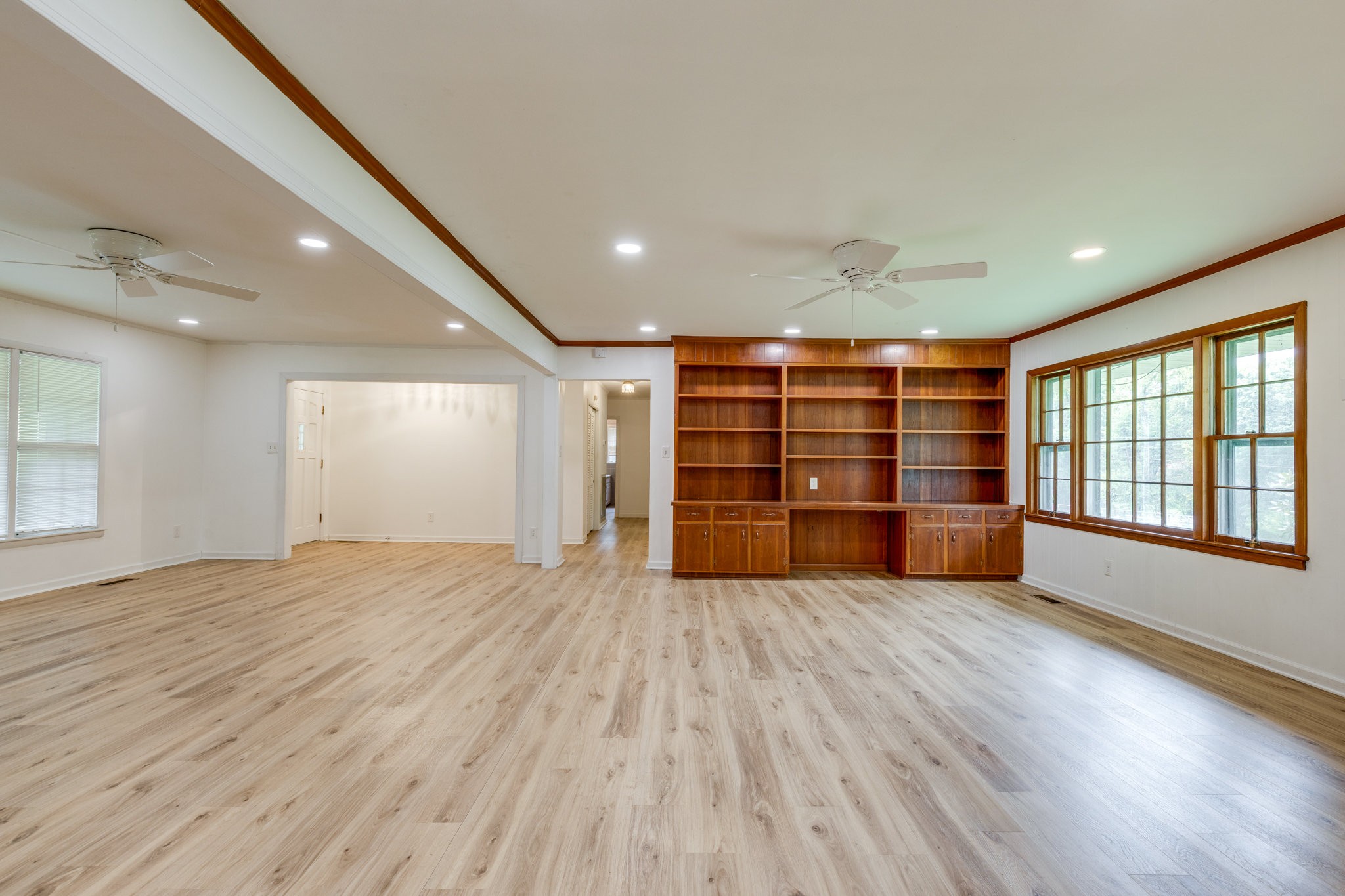 106 Sunset Drive Pulaski, TN 38478 - Photo 11 of 36 a view of an empty room with a window and wooden floor