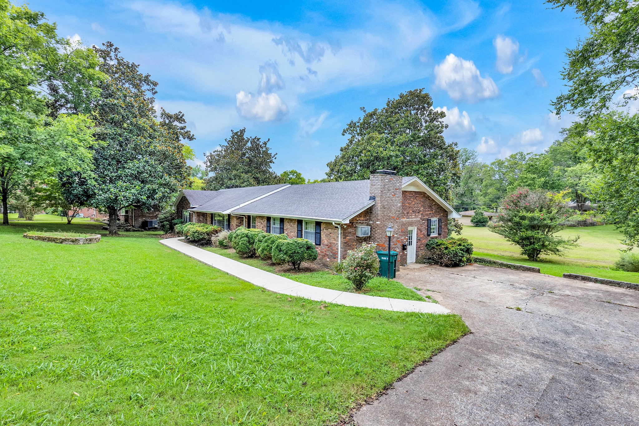 106 Sunset Drive Pulaski, TN 38478 - Photo 2 of 36 a front view of a house with garden