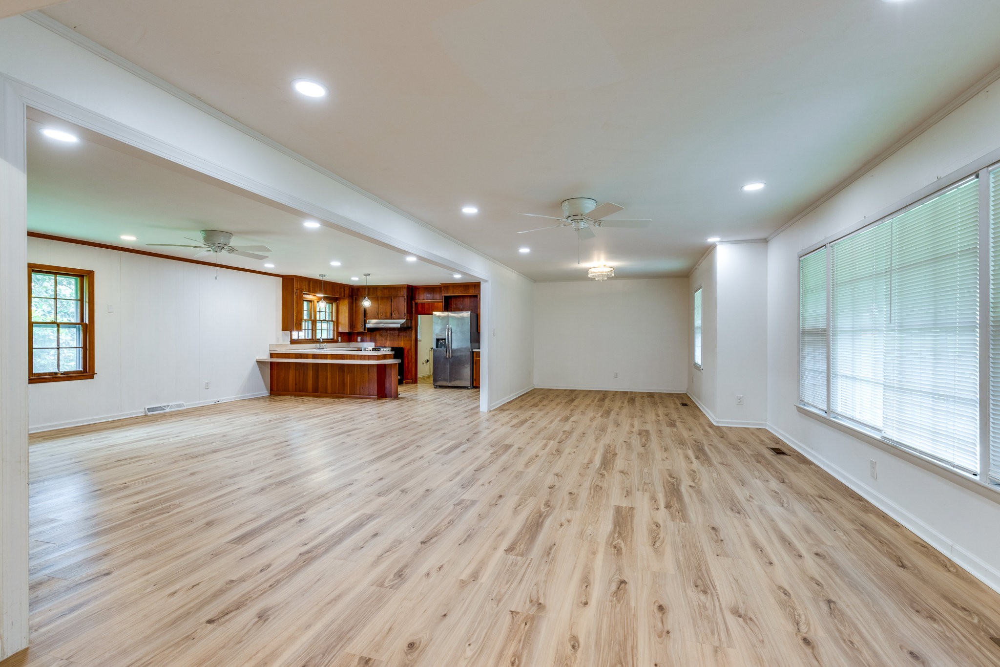 106 Sunset Drive Pulaski, TN 38478 - Photo 6 of 36 a view of empty room with wooden floor and fireplace