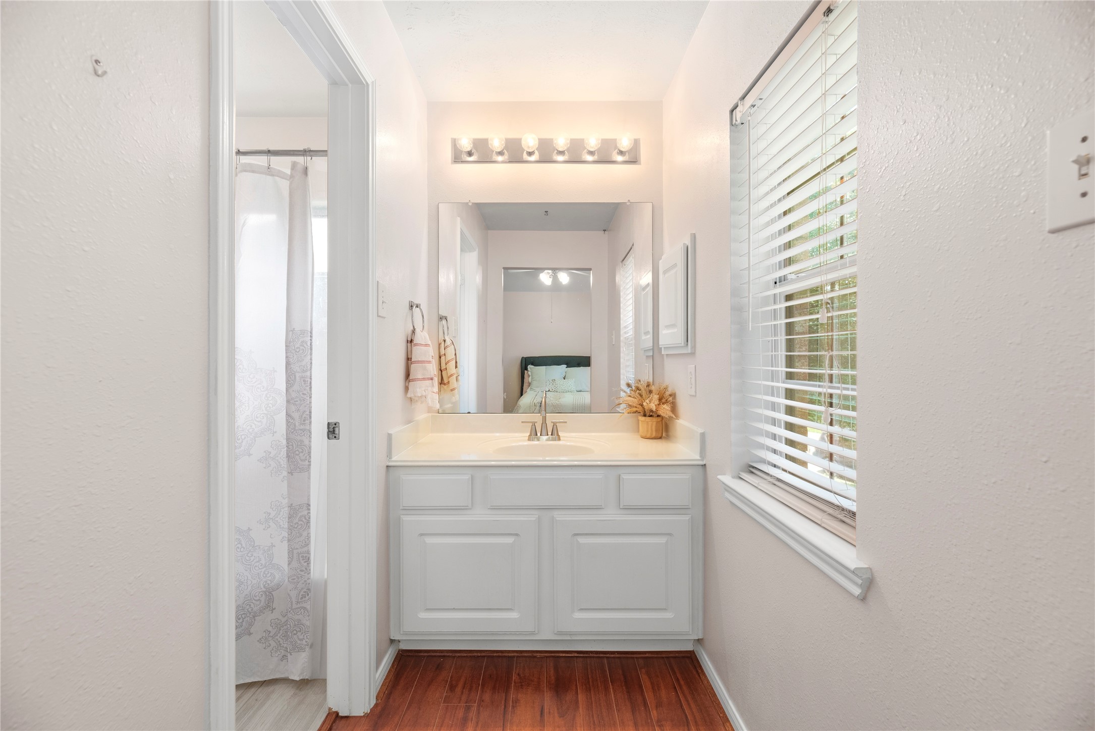 7930 Chateau Point Lane Houston, TX 77041 - Photo 26 of 34 Bright vanity connected to the secondary bedroom. I love the window adding natural light to this space.