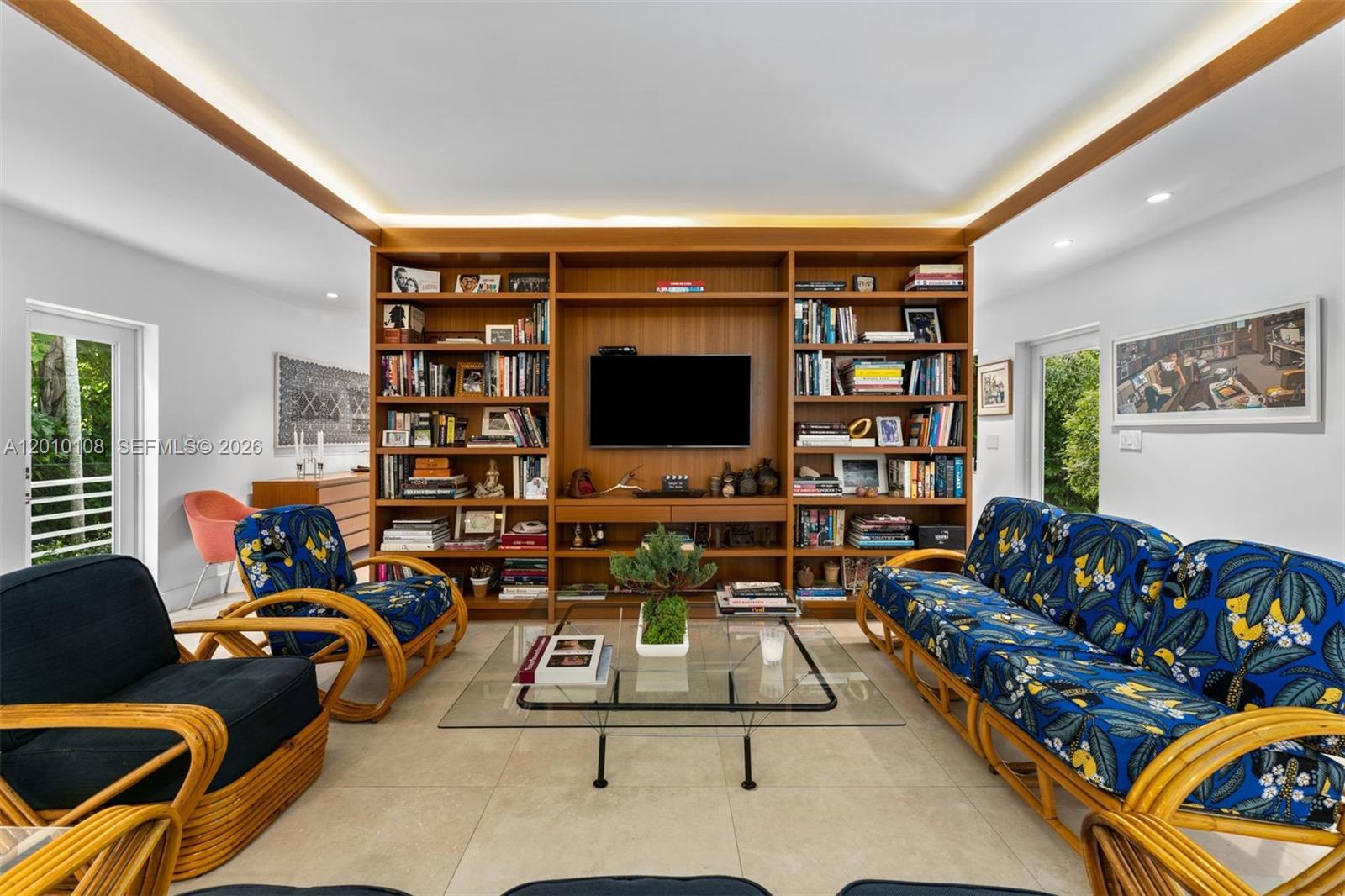 690 Warren Lane Key Biscayne, FL 33149 - Photo 14 of 39 a living room with furniture workspace and a flat screen tv