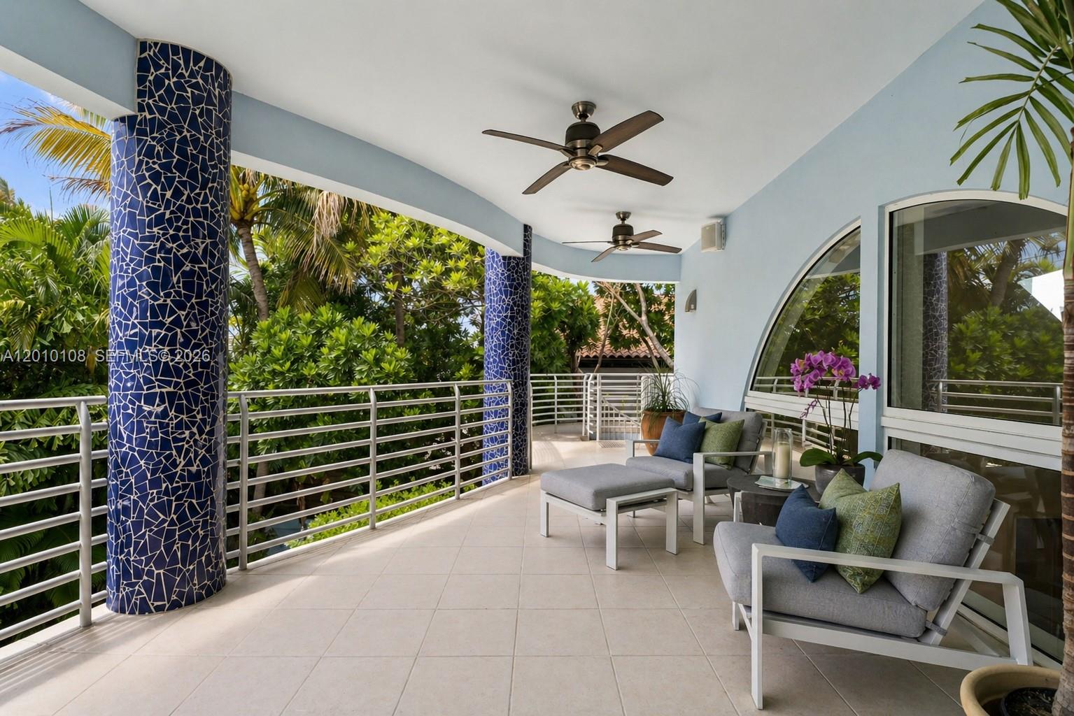 690 Warren Lane Key Biscayne, FL 33149 - Photo 23 of 39 a living room with furniture and a window