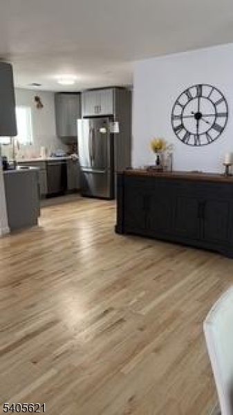 111 Pennington Street Newark, NJ 07105 - Photo 3 of 13 a view of kitchen with wooden cabinet