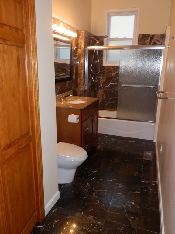 194 Auburn Street, Unit 1 Newton, MA 02466 - Photo 6 of 15 a bathroom with a toilet