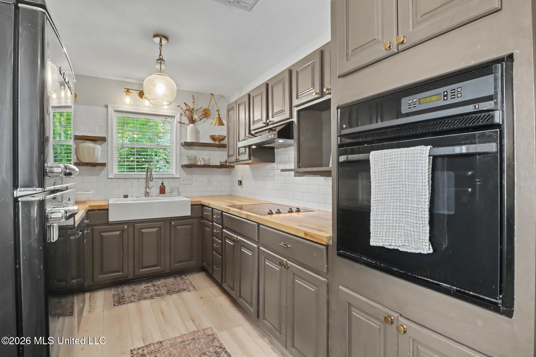 17074 Doc Lizana Road Gulfport, MS 39503 - Photo 9 of 32 painted kitchen cabinets