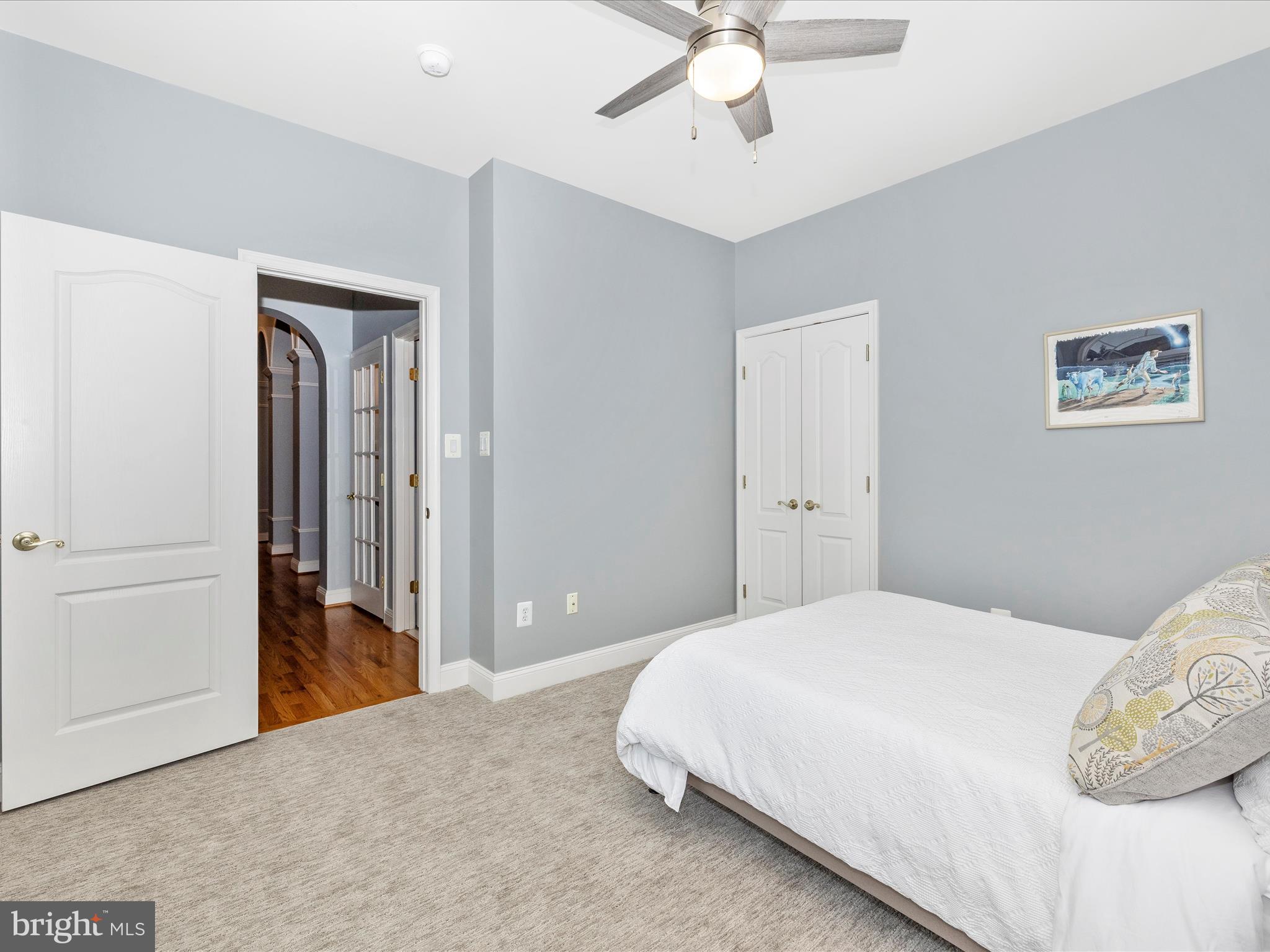 2661 Monocacy Ford Road Frederick, MD 21701 - Photo 33 of 52 a bedroom with a bed and a chandelier