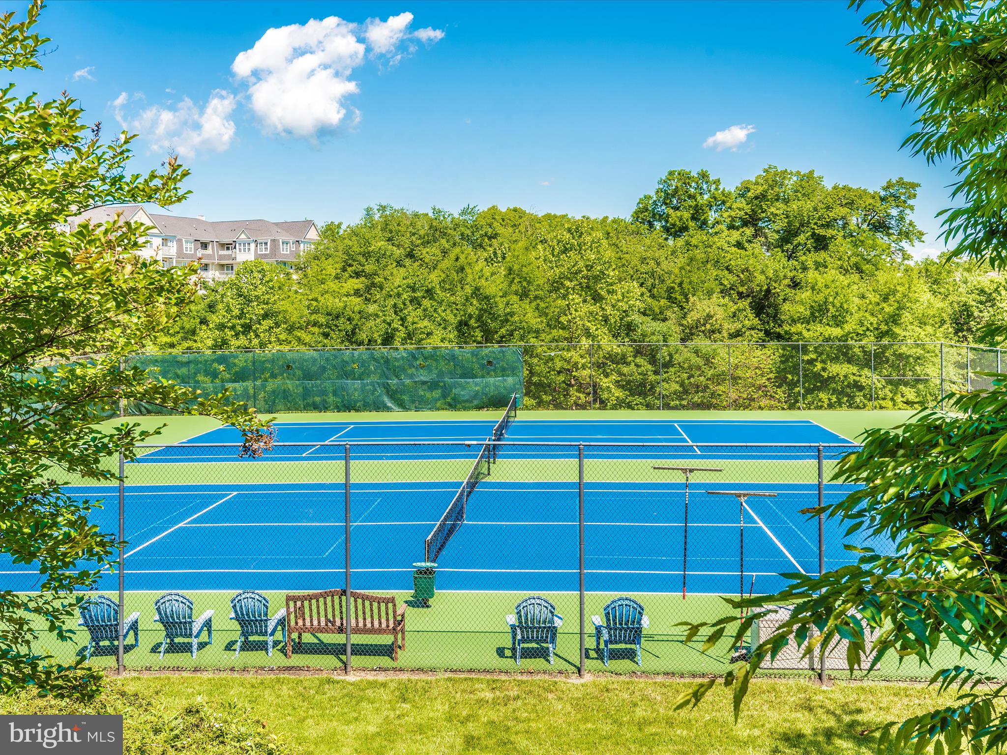 2661 Monocacy Ford Road Frederick, MD 21701 - Photo 48 of 52 a view of a tennis ground with large trees