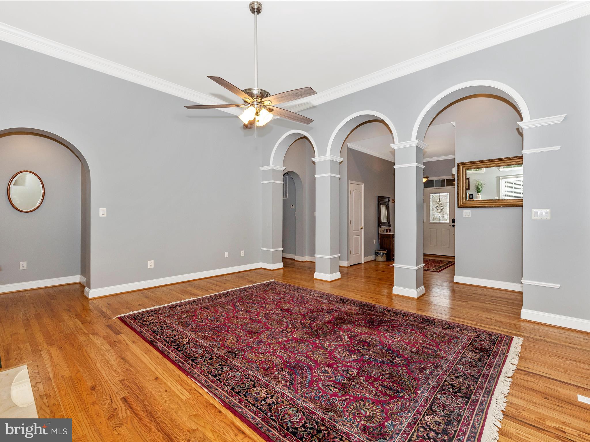 2661 Monocacy Ford Road Frederick, MD 21701 - Photo 10 of 52 a view of a hallway with wooden floor and chandelier