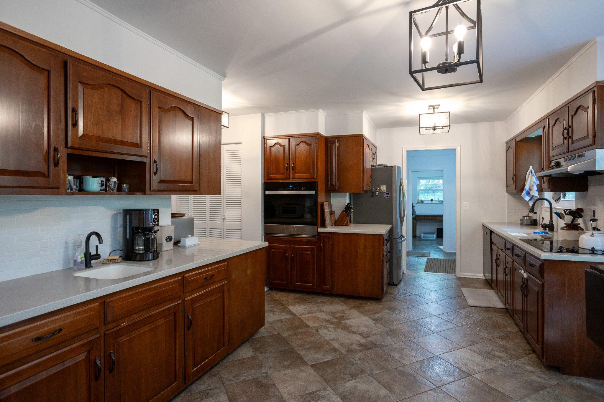 14815 Hanover Pike Upperco, MD 21155 - Photo 7 of 29 Warm kitchen with modern charm.