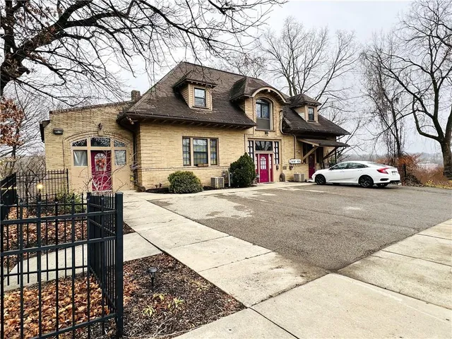a view of a street with cars