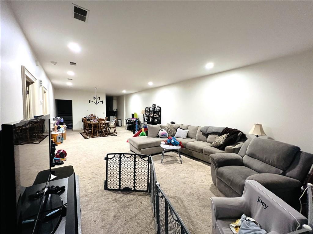 304 Rhodes Place New Castle, PA 16101 - Photo 15 of 31 a living room with furniture and a flat screen tv