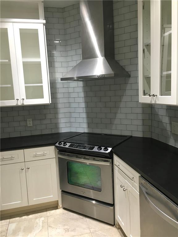 304 Rhodes Place New Castle, PA 16101 - Photo 19 of 31 a kitchen with granite countertop cabinets stove top oven and sink