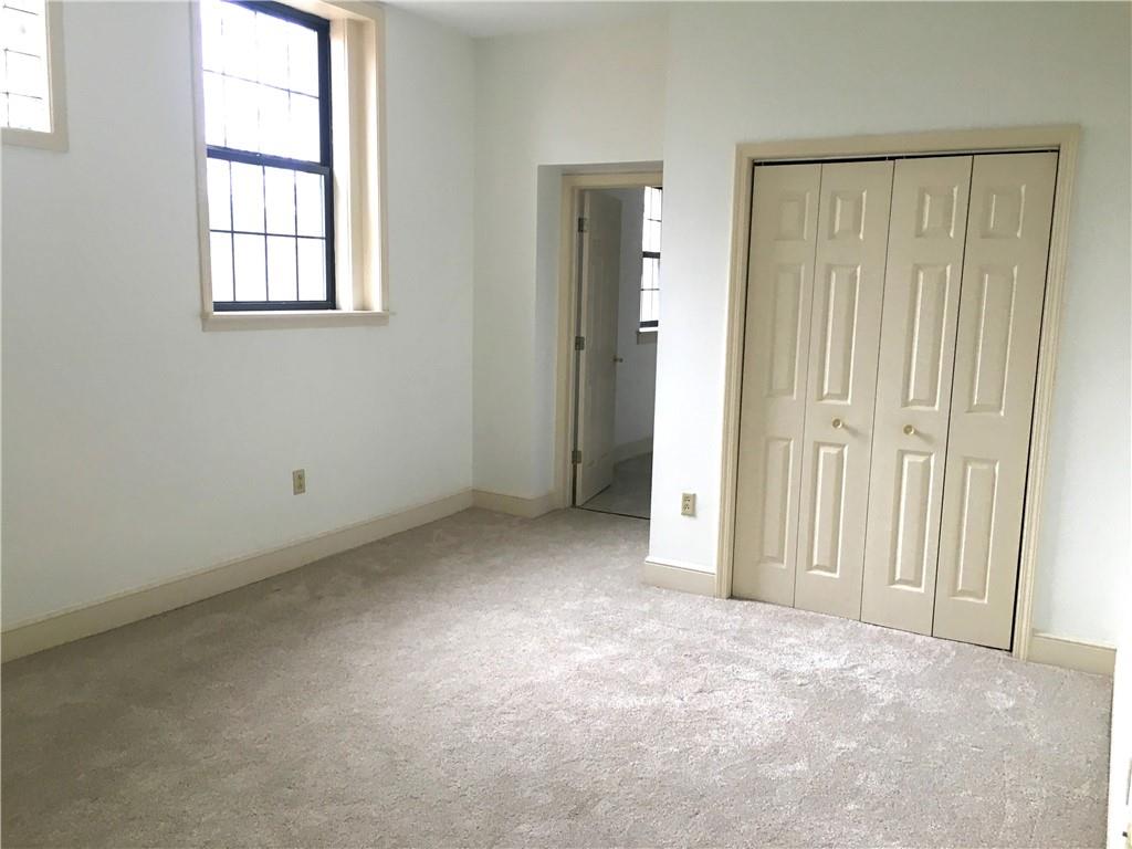 304 Rhodes Place New Castle, PA 16101 - Photo 21 of 31 an empty room with windows