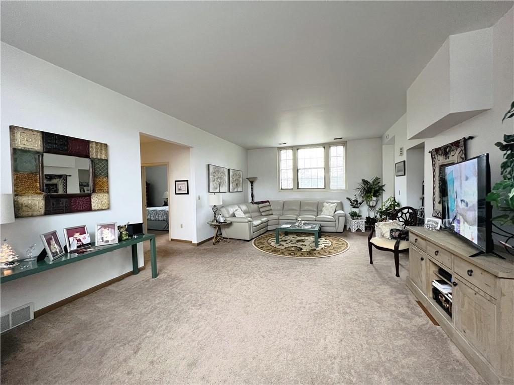 304 Rhodes Place New Castle, PA 16101 - Photo 25 of 31 a living room with furniture and a flat screen tv