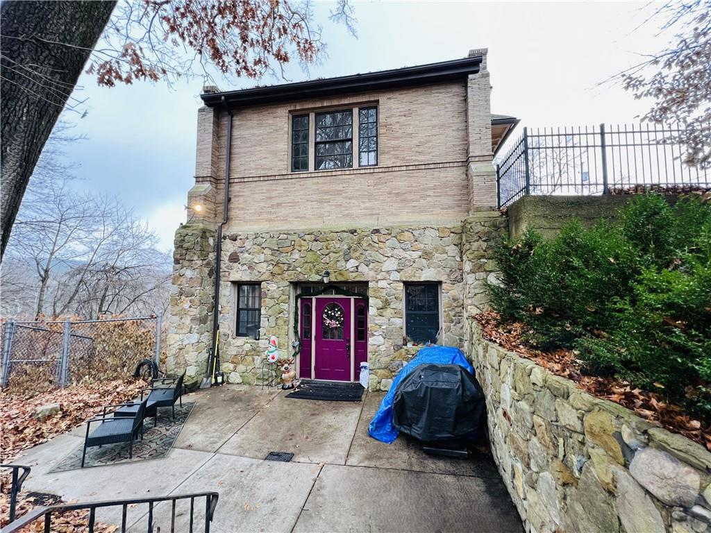 304 Rhodes Place New Castle, PA 16101 - Photo 5 of 31 a front view of a house with yard