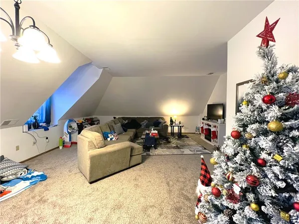 a living room with furniture and a couch
