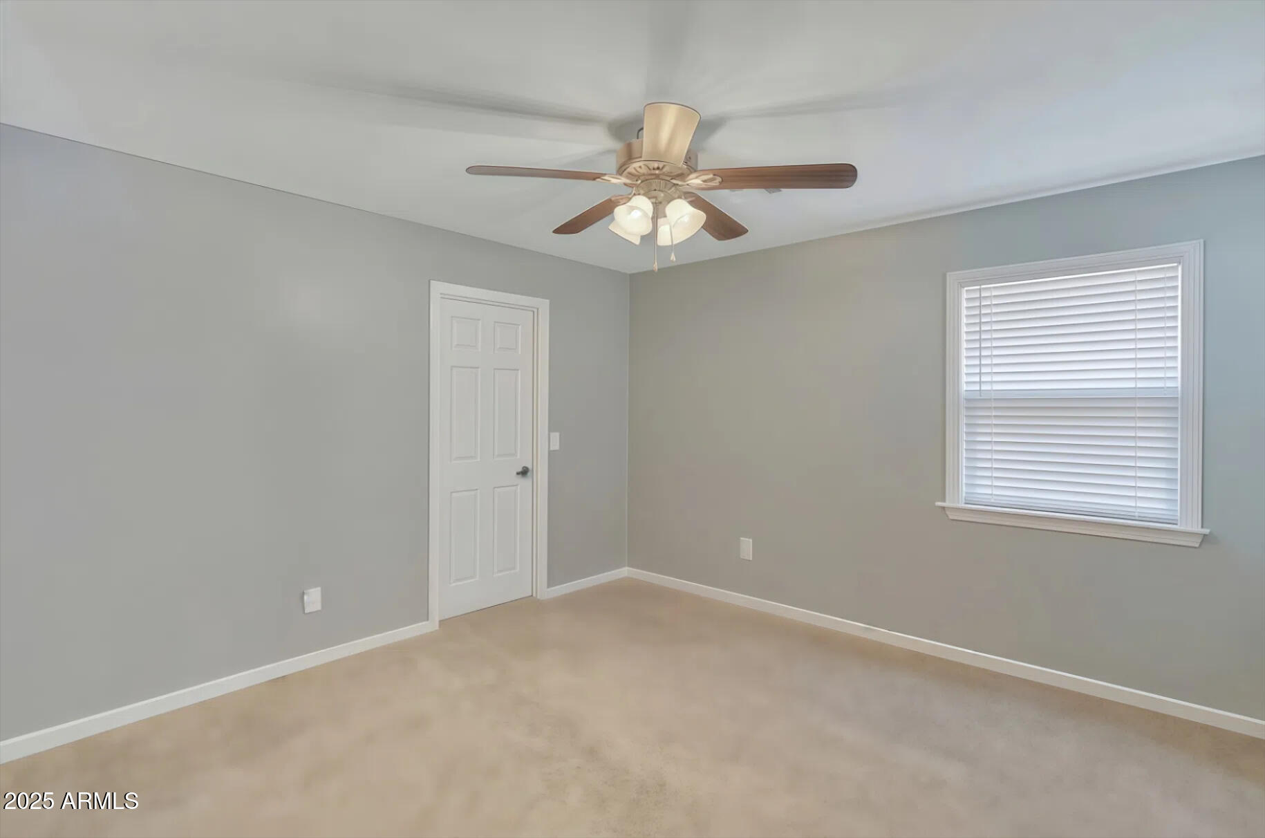 7538 West Redbird Road Peoria, AZ 85383 - Photo 15 of 24 a view of an empty room with a window