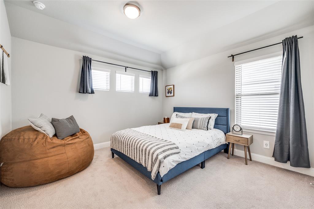 16564 Creek Plum Road Frisco, TX 75033 - Photo 20 of 30 Bedroom with carpet flooring and lofted ceiling