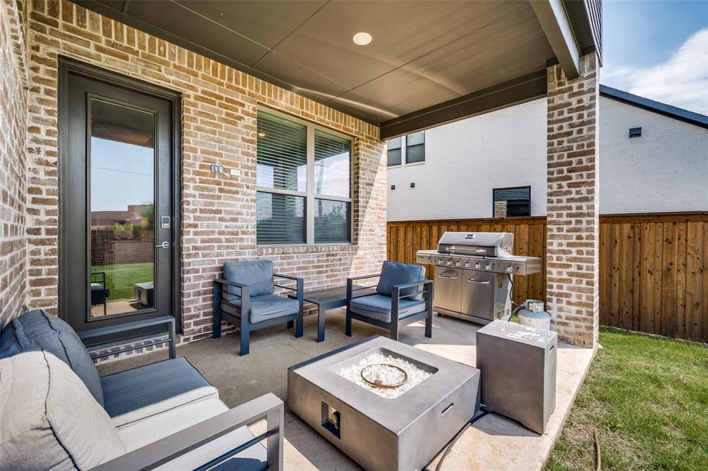 16564 Creek Plum Road Frisco, TX 75033 - Photo 23 of 30 View of patio featuring an outdoor living space with a fire pit and grilling area