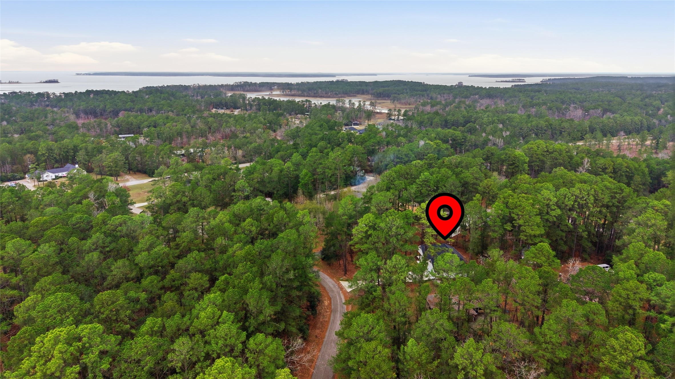 235 Dogwood Road Brookeland, TX 75931 - Photo 4 of 35 a view of a city and mountains
